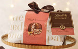 immagine-2-lindt-panettone-natale-cioccolato-e-arance-con-gocce-di-cioccolato-1-kg-ean-8003340012322